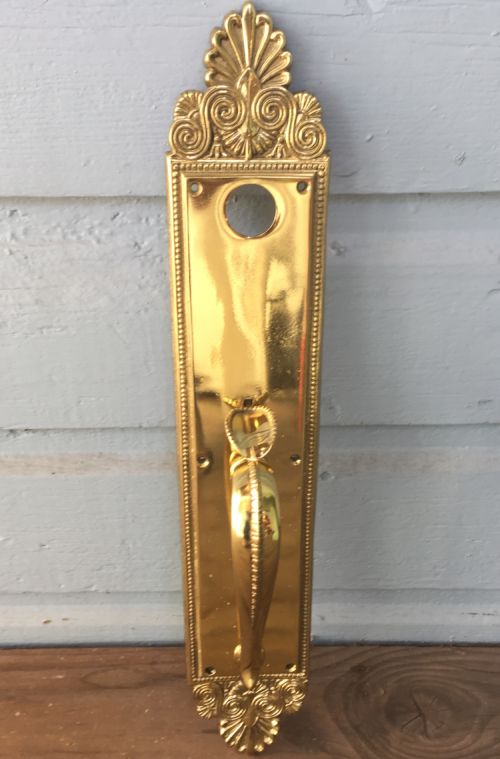 Ornate brass door pull
