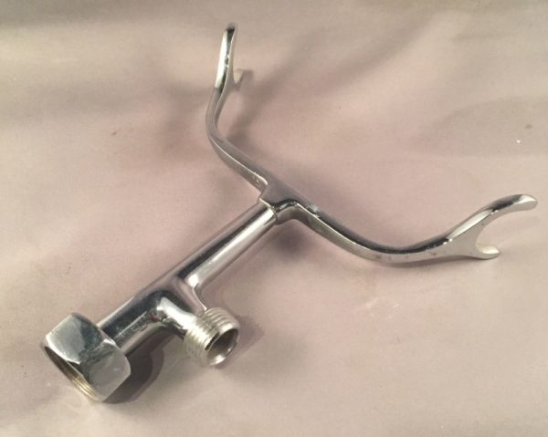 Faucet mount handheld wand cradle