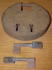 Old style round padlock, reproduction, made of rusty steel
