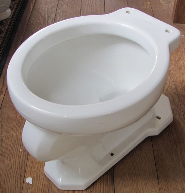 antique toilet bowl, white porcelain