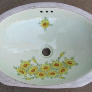 antique floral undermount basin, oval in shape