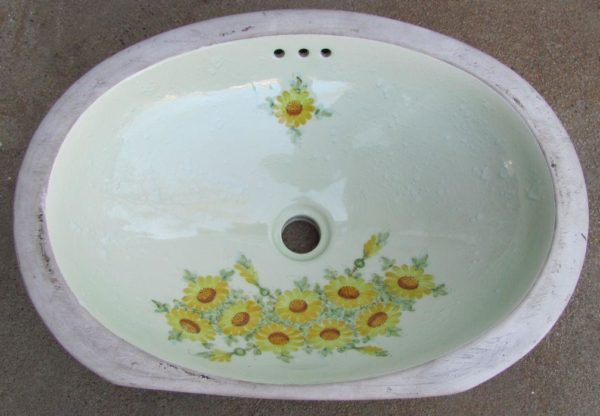 antique floral undermount basin, oval in shape