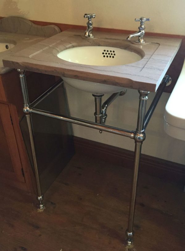 Antique red marble slab, sink, and console legs, chrome finish on legs