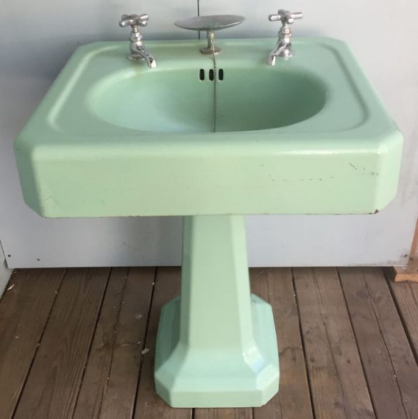 3/4 view Standard ming green Cast iron pedestal sink prop rental