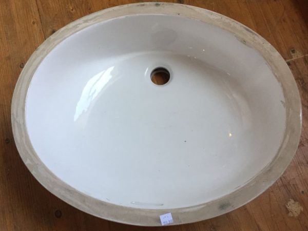 top view vintage Standard undermount oval sink. Color is white