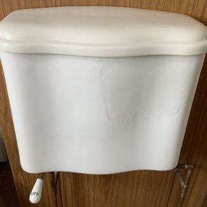 Antique Peerless toilet tank, lid is mismatched in color
