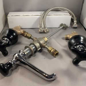 Black Standard widespread faucet, restored