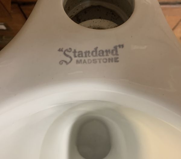 Standard Madstone urinal logo