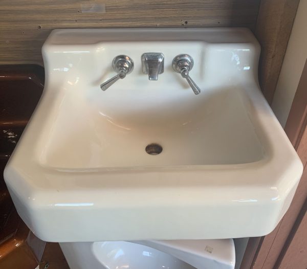 Washington Pottery Cast Iron lavatory sink with faucet, white in color
