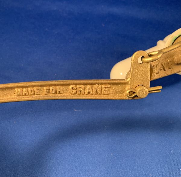 Crane logo on flush lever