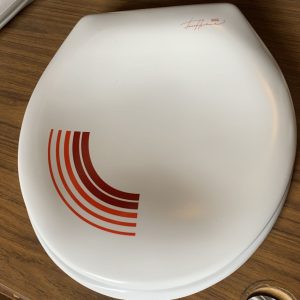 Pressalit Dania toilet seat with red striping