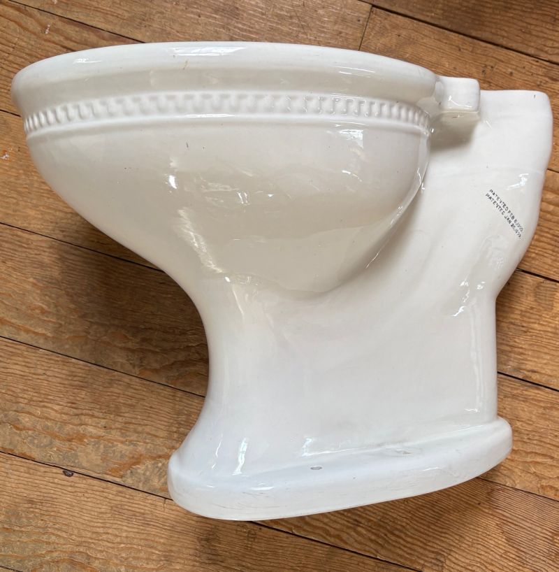 side view of 1910 Crane Saneto beaded rim toilet bowl