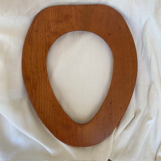Elongated Mixed Wood Finished Toilet Seat lid underside
